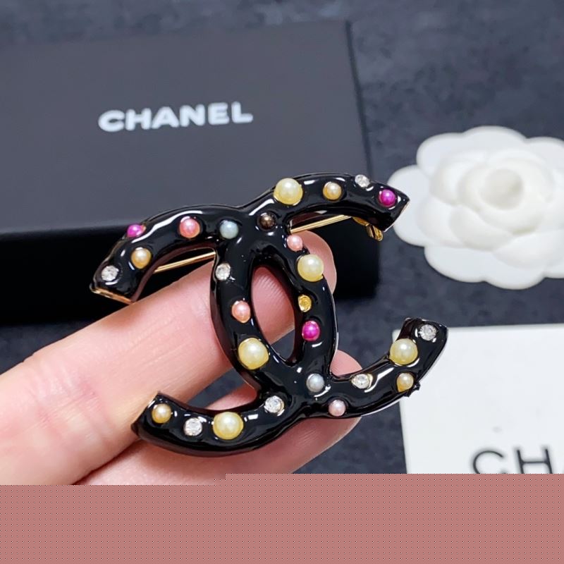 Ch*el brooches